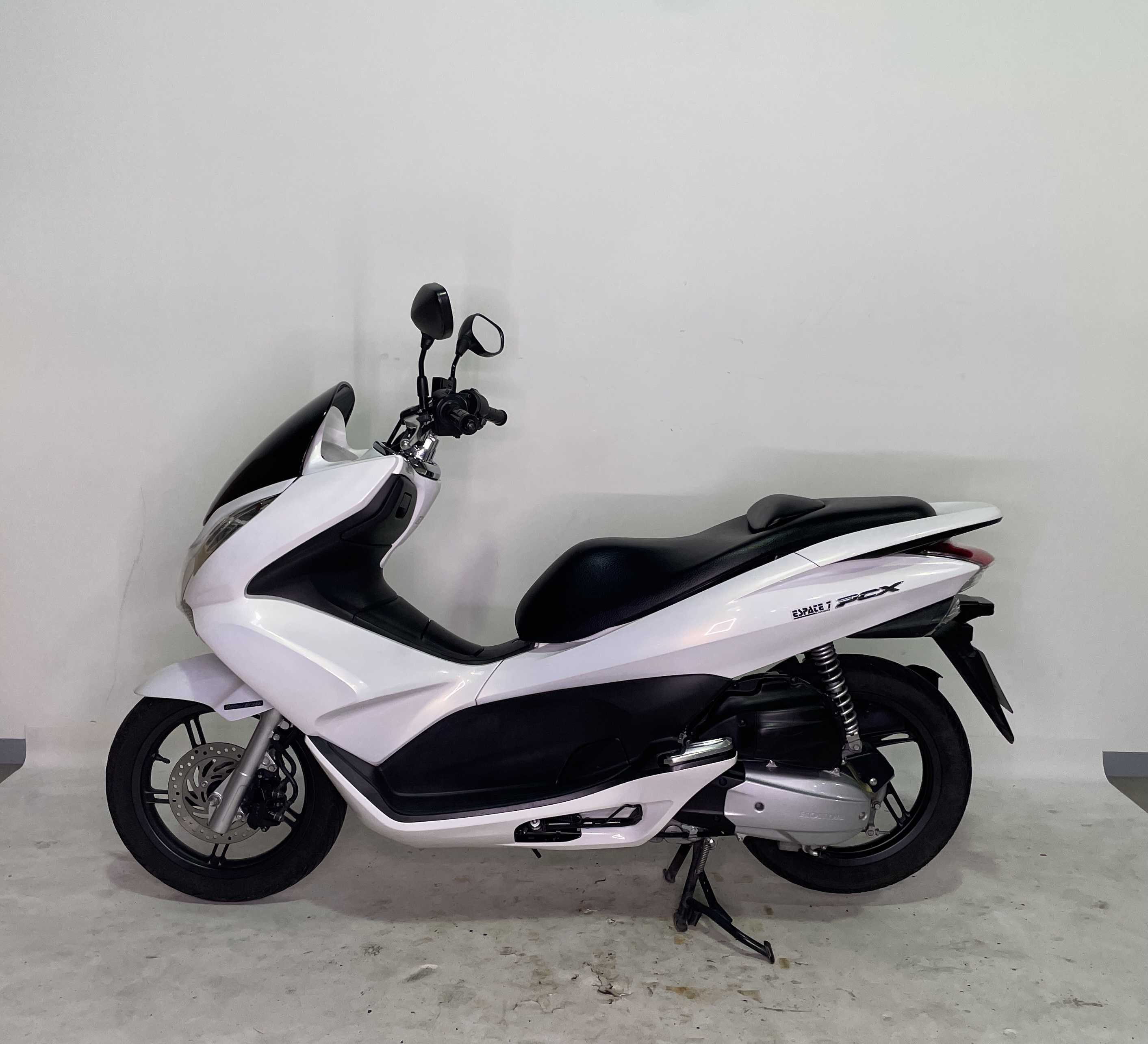 Honda PCX125 2010 HD vue gauche